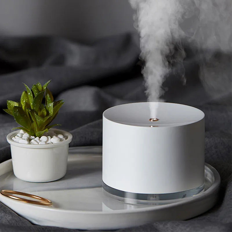 Portable USB rechargeable 2000mAh air humidifier and night light diffuser.